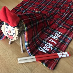 Manta personalizada y palos para el Tió